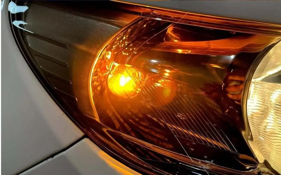 Amber headlight lens restoration — after