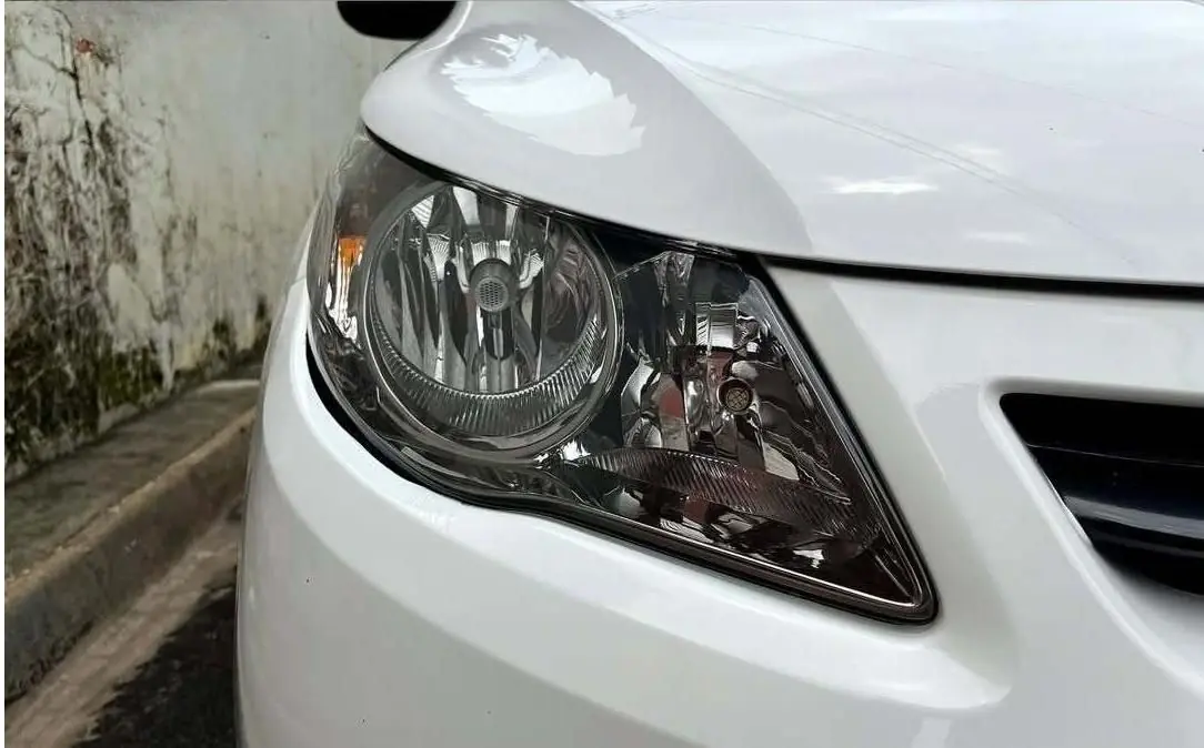 White car headlight restoration — after